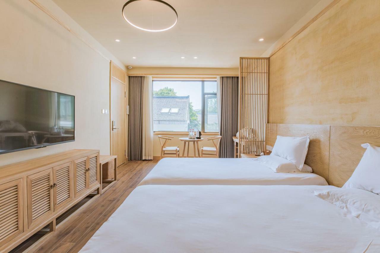 Hangzhou Van Wind Inn Exterior photo